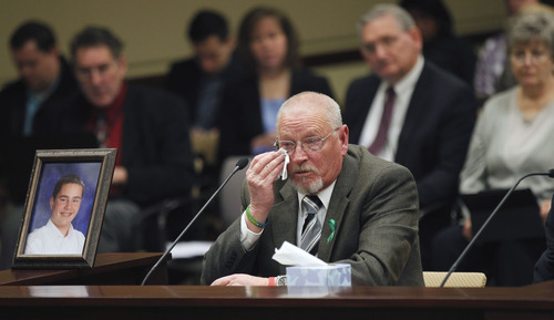 Al Hartmann  |  The Salt Lake Tribune
Bud Peterson speaks at the House Education Committee for passage of HB134 that would require parental notification when a student has been involved in a threat of suicide or violence. His son Buddy in photo at left, committed suicide from bullying.