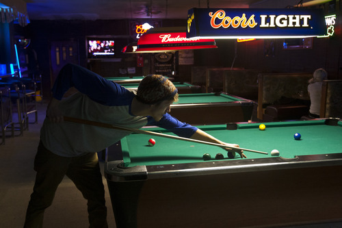 Chris Detrick  |  The Salt Lake Tribune
Louis Crocco plays pool at X Wife's Place Tuesday February 12, 2013.