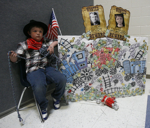 Rick Egan  | The Salt Lake Tribune 
Cooper Kirby poses as Butch Cassidy, in the wax museum at Copper Canyon Elementary School, in West Jordan, Thursday, February 21, 2013. The annual mock wax museum is a third grade research project.