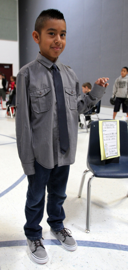 Rick Egan  | The Salt Lake Tribune 
Richard Rodriguez poses as President Barack Obama,  in the wax museum at Copper Canyon Elementary School, in West Jordan, Thursday, February 21, 2013. The annual mock wax museum is a third grade research project.