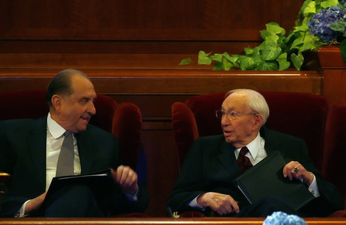 Tribune file photo 
LDS Church President Gordon B. Hinckley talks with Thomas S. Monson after delivering a conference speech in 2007. Monson succeeded Hinckley after the latter's death in late January 2008.