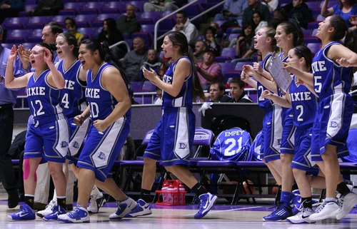 Leah Hogsten  |  The Salt Lake Tribune
Dixie celebrates the win.Dixie High School defeated Cedar High School 33-31 during their 3A Utah High School Girls Basketball semifinal matchup at Weber State University, February 22, 2013.
