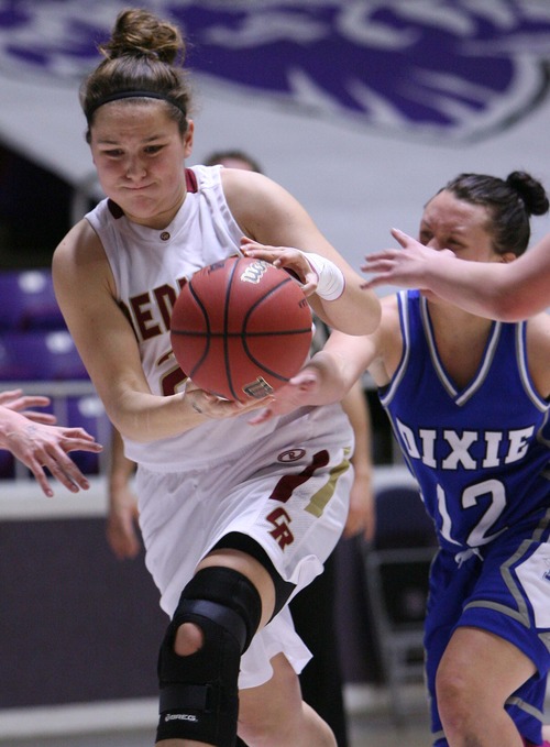 Leah Hogsten  |  The Salt Lake Tribune
Cedar's Courtney Morley gets the ball knocked out of her hands by Dixie's Dee Harmann. Cedar High School Dixie High School during their 3A Utah High School Girls Basketball semifinal matchup at Weber State University, February 22, 2013.