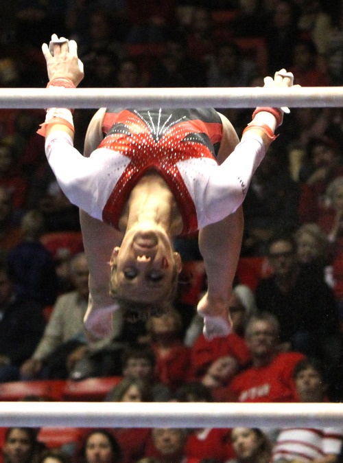 Rick Egan  | The Salt Lake Tribune 

Mary Beth Lofgren does an exhibition routine on the bars for the Utes, in gymnastics action against The University of California, at the Huntsman Center, Saturday, February 9, 2013.