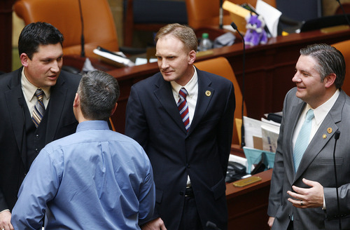 Scott Sommerdorf   |  The Salt Lake Tribune
Rep. Craig Hall, R-West Valley City, who replaced longtime Democratic Rep. Neal Hendrickson, speaks with other representatives after the Thursday session adjourned, Thursday, February 21, 2013. At  the far left is Rep. Ryan Wilcox, R-Ogden, left foreground is Rep. Daniel McCay, R-Riverton, and Rep. John Knotwell, R-Herriman at the far right.