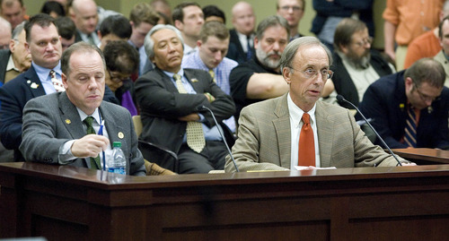Paul Fraughton  |  The Salt Lake Tribune
Steve Gunn, right, sitting next to Rep. Brian Greene, voices his opposition to Greene's HB114, which would allow local sheriffs to arrest federal agents trying to seize guns from Utah residents. In his arguments Gunn mentioned the supremacy clause in the U.S. Constitution, which legal analysts have said would make HB114 unconstitutional. 
 Friday, February 22, 2013