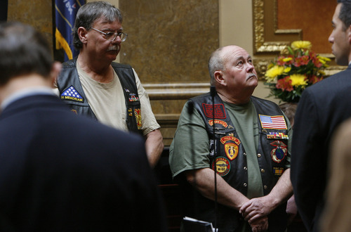 Francisco Kjolseth  |  The Salt Lake Tribune
Veterans Denny Larsen, left, of West Point and Brent Messick of Hooper, are honored at the Utah State Capitol along with many others representing all branches of the military on Friday, February 22, 2013. Rep. Curt Oda, R-Clearfield, proposed HCR6 as a resolution recognizing the 50th anniversary of the Vietnam War.
