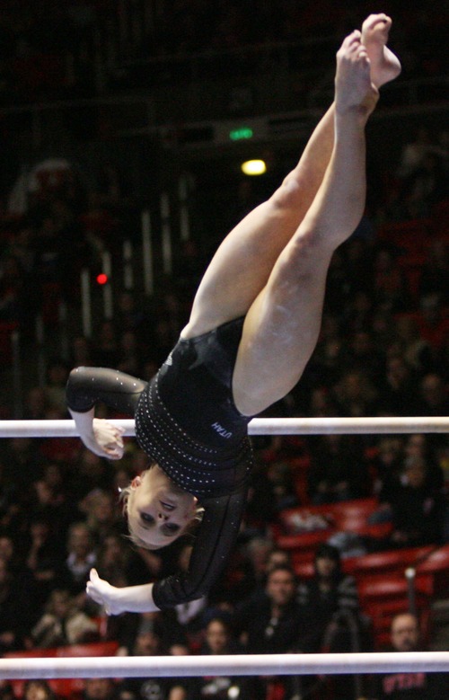 Kim Raff  |  The Salt Lake Tribune
University of Utah gymnast Georgia Dabritz performs her routine on the uneven bars during a meet against Stanford at the Huntsman Center in Salt Lake City on February 23, 2013.