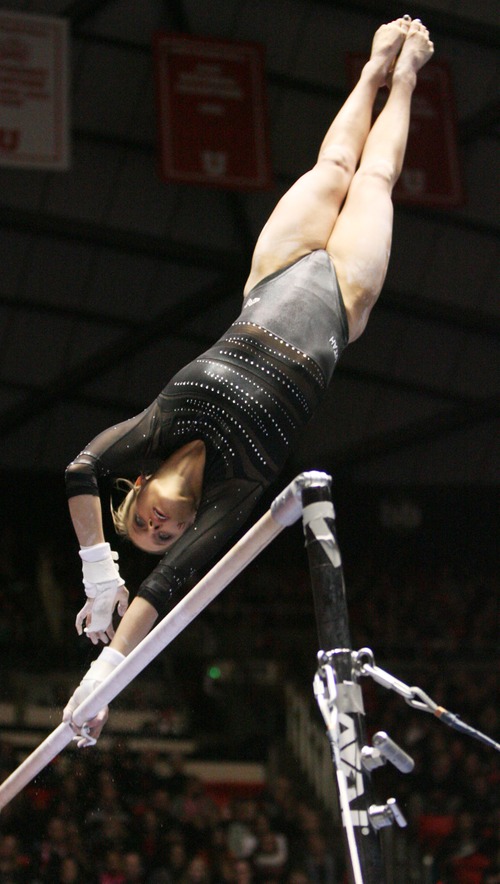 Kim Raff  |  The Salt Lake Tribune
University of Utah gymnast Breanna Hughes performs her routine on the uneven bars during a meet against Stanford at the Huntsman Center in Salt Lake City on February 23, 2013.