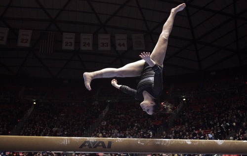 Kim Raff  |  The Salt Lake Tribune
University of Utah gymnast Becky Tutka performs a beam routine during a meet against Stanford at the Huntsman Center in Salt Lake City on February 23, 2013.