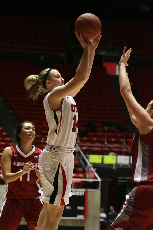 Kim Raff  |  The Salt Lake Tribune
University of Utah player Paige Crozon shoots a field goal against Washington State during a game at the Huntsman Center in Salt Lake City on February 24, 2013. Utah went on to win 59-47.