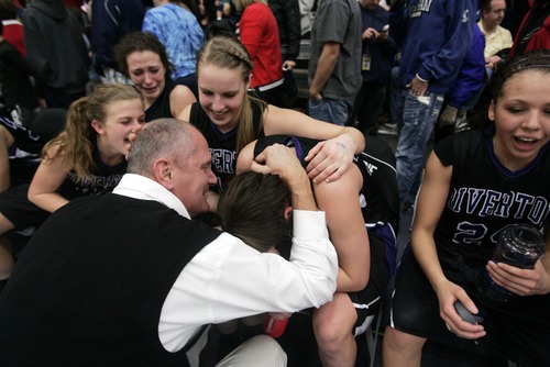 Kim Raff  |  The Salt Lake Tribune
Riverton coach Ron Ence hugs Kylee Currie and celebrates with his team after winning the 5A State Championship after defeating Layton 41-37 during the UHSAA 5A State Championship at Salt Lake Community College in Salt Lake City on February 23, 2013.