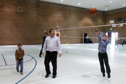 Trent Nelson  |  The Salt Lake Tribune
William E. Jessop plays basketball with his sons Nathan and Jared as a group of FLDS members gather to recreate at El Capitan School, Sunday, February 17, 2013 in Colorado City.