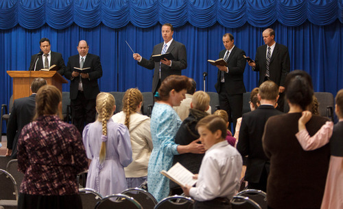 Trent Nelson  |  The Salt Lake Tribune
Sam Allred leads a congregation of FLDS members in a hymn during church services Sunday, February 17, 2013 in Hildale. Left to right on stage are William E. Jessop, Garth Warner, Allred, Dan Timpson and Royce Jessop