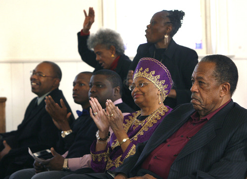 Scott Sommerdorf   |  The Salt Lake Tribune
Addie Norling, in purple, claps to the choir along with the rest of the congregation during the Founders Day celebration at Trinity AME Community Church in Salt Lake City Sunday, February 23, 2013.