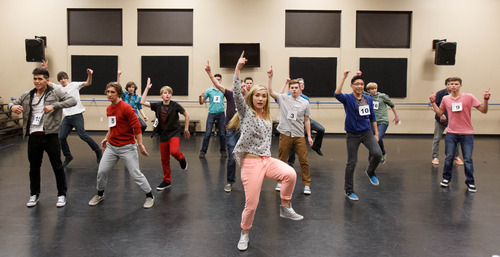 Trent Nelson  |  The Salt Lake Tribune
Choreographer Kelli Calvert leads teenage boys through a dance routine Saturday in Highland during auditions to join a new five-member boy band, Hollintown, being formed by two Utahns. Two teens were chosen Saturday to join three Utah boys chosen in earlier tryouts.