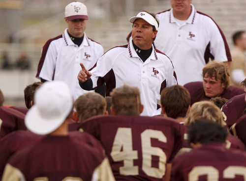Trent Nelson | Salt Lake Tribune
Lone Peak High School football Tony McGeary resigned this week amid financial mismanagement allegations. He is seen here addressing the team after losing to Skyline on Oct. 31, 2008.