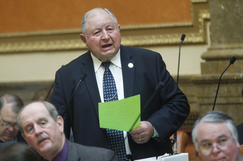 Al Hartmann  |  The Salt Lake Tribune
Rep. Mel Brown, R-Coalville, stands in the House of Representatives Monday February 25 to give a first look at the "green sheet" on Utah revenue estimates that will be a big determiner in the state's $13 billion budget.