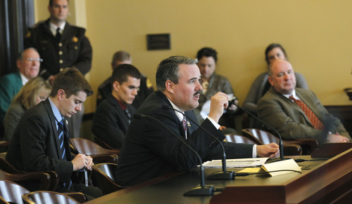 Al Hartmann  |  The Salt Lake Tribune
Rep. Lee Perry, R-Perry, a Utah Highway Patrol trooper speaks in the House Transportation Committee Tuesday February 26 for passage of HB283 which would make not buckling up a primary offense on freeways and any roads with speed limit over 55