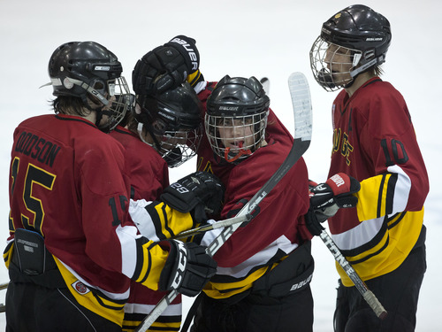 Lennie Mahler  |  The Salt Lake Tribune
Judge Memorial players celebrate a goal by Nickolas O'Cain against Viewmont in the state hockey title game. O'Cain had 4 goals to lead Judge to a 5-2 rout.