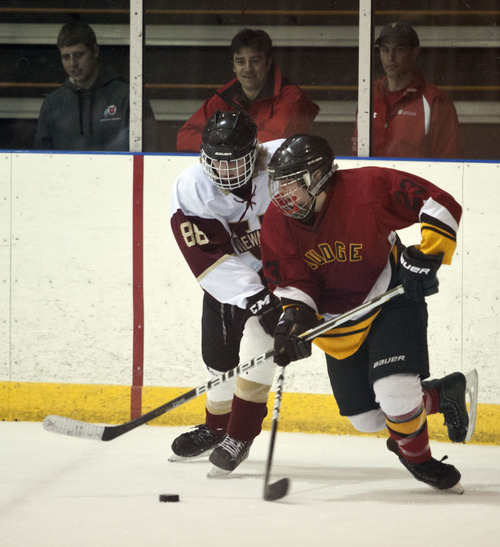 Lennie Mahler  |  The Salt Lake Tribune
Judge Memorial's Nickolas O'Cain controls the puck in front of Viewmont's Riggs Zeidler. O'Cain had 4 goals to lead Judge to a 5-2 rout.