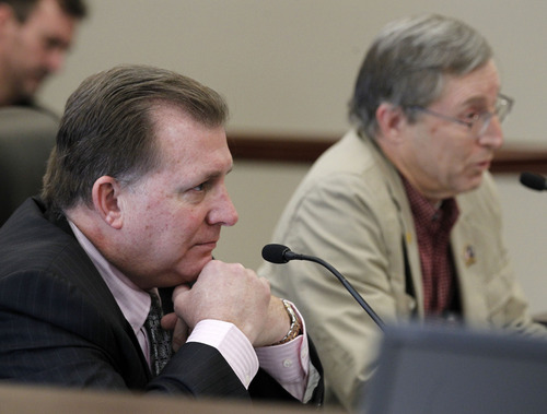 Al Hartmann  |  The Salt Lake Tribune
Senator Curtis Bramble, R-Provo,  left, listens as Ron Mortensen speaks about SB225 in the Senate Business and Labor Committee Wendesday February 27.  The bill would push back the start date of Utah's guest-worker program for illegal immigrants two years from the original start date of July 1.   Bramble is sponsor of the bill.