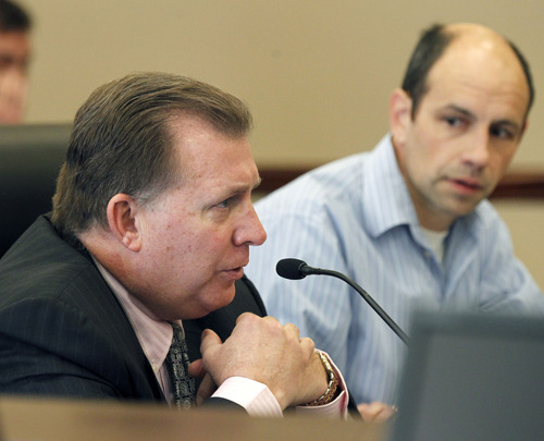 Al Hartmann  |  The Salt Lake Tribune
Senator Curtis Bramble, R-Provo,  left, speaks for SB225 in the Senate Business and Labor Committee Wendesday February 27.  The bill would push back the start date of Utah's guest-worker program for illegal immigrants two years from the original start date of July 1.   Citizen Mark Alvarez at right spoke about the bill.