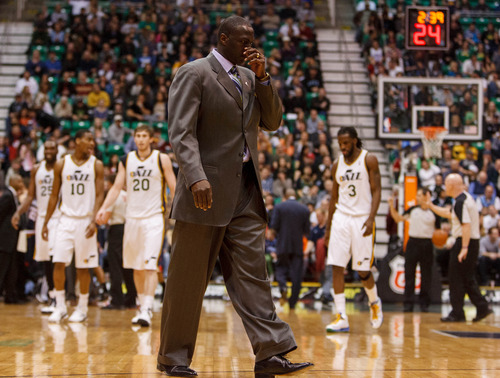 Trent Nelson  |  The Salt Lake Tribune
Utah Jazz head coach Tyrone Corbin walks onto the court as a timeout is called late in the fourth quarter with the Jazz trailing by ten points as the Utah Jazz host the Atlanta Hawks, NBA basketball Wednesday, February 27, 2013 in Salt Lake City.