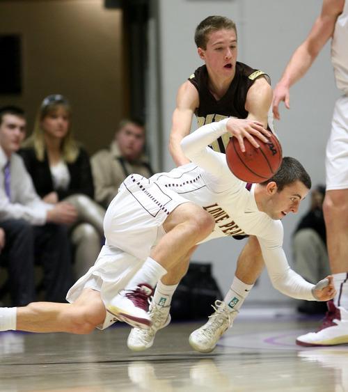 Steve Griffin | The Salt Lake Tribune


Lone Peak's Nick Emery slips as he tries to drive during 5A state basketball game against Davis at the Dee Events Center in Ogden, Utah Wednesday February 27, 2013.