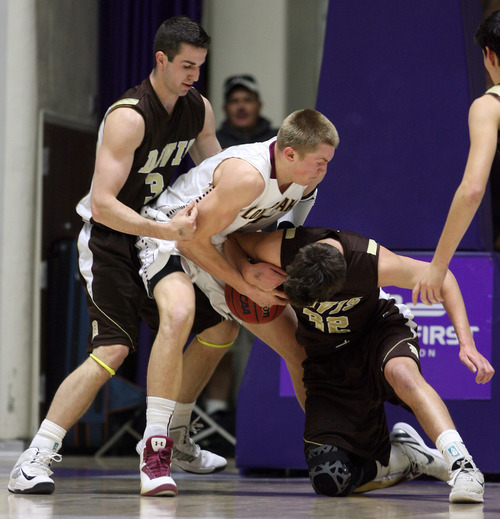 Steve Griffin | The Salt Lake Tribune


Lone Peak's Eric Mika, center, gets double teamed by Davis high's Cole Hally and Braden Koelliker during the 5A state basketball tournament at the Dee Events Center in Ogden, Utah Wednesday February 27, 2013.