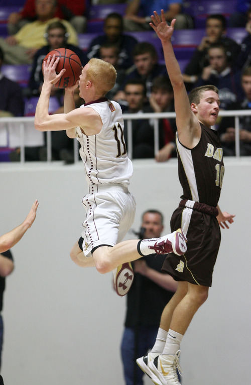 Steve Griffin | The Salt Lake Tribune


Lone Peak's T.J. Haws hangs in the air as he sails past Davis defender Jesse Wadeduring 5A state basketball game at the Dee Events Center in Ogden, Utah Wednesday February 27, 2013.