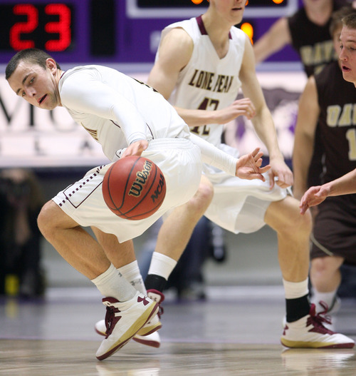 Steve Griffin | The Salt Lake Tribune


Lone Peak's Nick Emery looks back after getting stripped of the ball during 5A state basketball game against Davis at the Dee Events Center in Ogden, Utah Wednesday February 27, 2013.