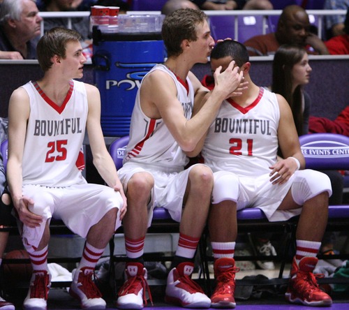 Leah Hogsten  |  The Salt Lake Tribune
Bountiful's Nate Pollard kisses the head of teammate Mosese Manu in celebration of the win. Bountiful High School defeated Roy High School 50-44 during their 4A State Basketball  quarterfinal game at Dee Events Center in Ogden, Thursday, February 28, 2013.