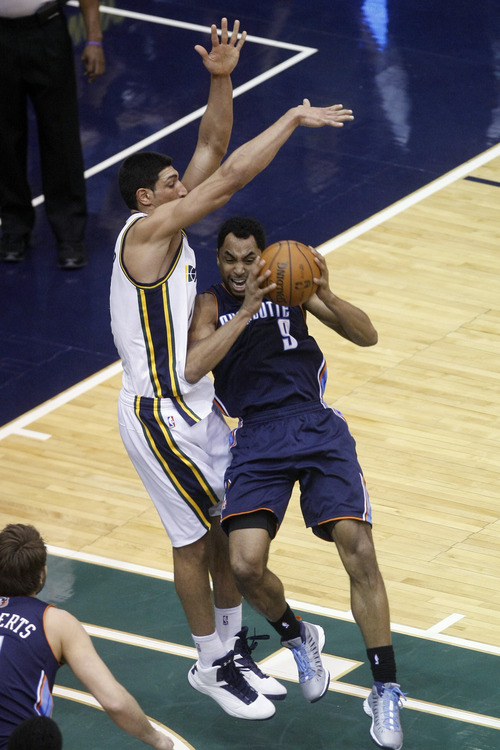 Chris Detrick  |  The Salt Lake Tribune
Utah Jazz center Enes Kanter (0) blocks Charlotte Bobcats shooting guard Gerald Henderson (9) during the first half of the game at EnergySolutions Arena Friday March 1, 2013.
