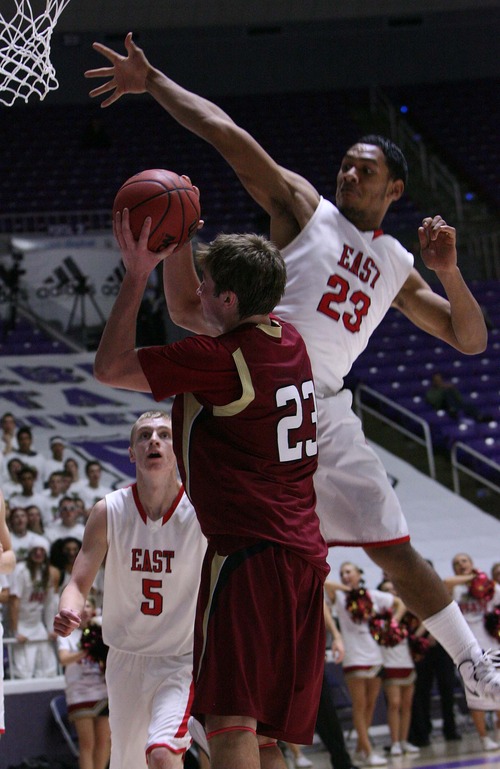 Leah Hogsten  |  The Salt Lake Tribune
Logan's Luke Falk is fouled by East's John Fakahafua. Logan High School defeated East High School 66-62 during their 4A State Basketball  quarterfinal game at Dee Events Center in Ogden, Thursday, February 28, 2013.