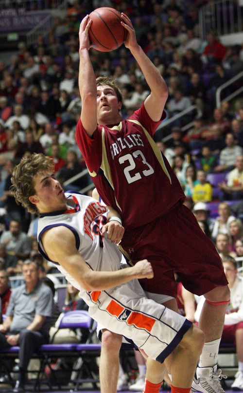 Kim Raff  |  The Salt Lake Tribune
(right) Logan's Luke Falk takes a shot as he is guarded by (left) Mountain Crest's Gaje Fergusen during the 4A state semifinal game at the Dee Event Center in Ogden on March 1, 2013. Mountain Crest went on to win 54-51.