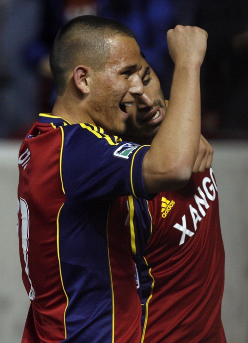 Rick Egan  | The Salt Lake Tribune 

Real Salt Lake's Luis Gil (21) celebrates with Real Salt Lake's Fabian Espindola (7) after Espindola scored in the second period, putting Real Salt Lake up 2-0, in RSL action, Real Salt Lake vs. Colorado Rapids at Rio Tinto Stadium, Saturday, April 7, 2012. Real Salt Lake's Luis Gil  has been one of the nation's most highly regarded young players throughout his teenage years. RSL expects Gil to have an impact this season.