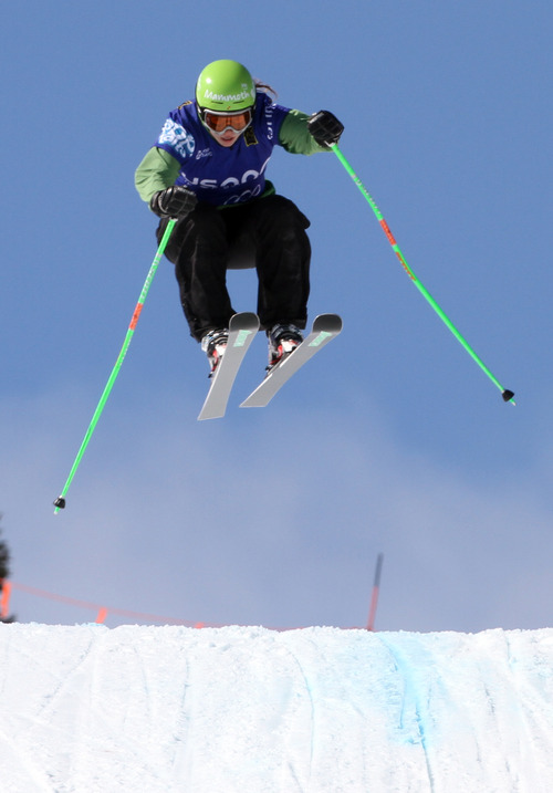 Rick Egan  | The Salt Lake Tribune 

Madeline Riffel flies over the last jump, as she  races to the finish line, in the Ladies Ski Cross at the Canyons, Friday, March 1, 2013.