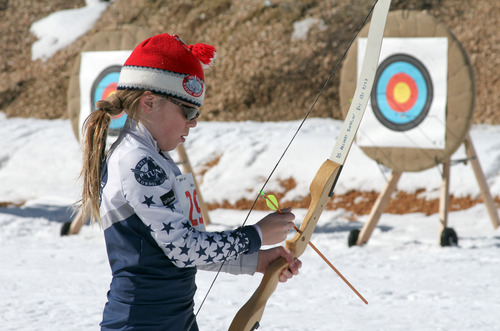 Francisco Kjolseth  |  The Salt Lake Tribune
Amie Francis, 8, of Salt Lake readies her arrow as she competes in the kids biathlon race for the annual Bryce Canyon Winter Festival being held Feb. 16-18 at Ruby's Inn in Bryce Canyon City.