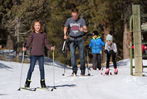 Francisco Kjolseth  |  The Salt Lake Tribune
Emmie Eresuma, 8, waits for her family to play catch up while cross country skiing during the annual Bryce Canyon Winter Festival being held Feb. 16-18 at Ruby's Inn in Bryce Canyon City.
