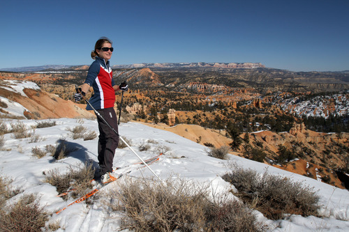 Francisco Kjolseth  |  The Salt Lake Tribune
Margot Miller of Salt Lake takes in the view after skiing to the rim of Bryce Canyon as she attends her first annual Bryce Canyon Winter Festival being held Feb. 16-18 at Ruby's Inn in Bryce Canyon City.