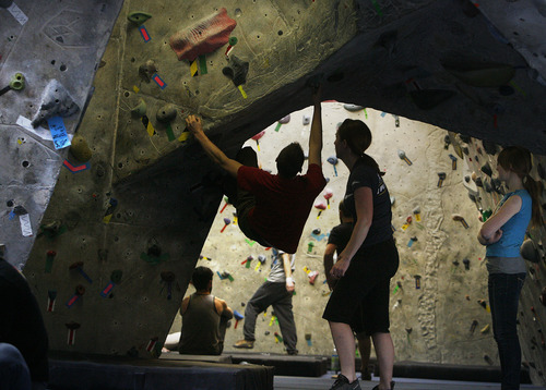 Scott Sommerdorf   |  The Salt Lake Tribune
Climbers climb at Rockreation in Holladay on Saturday. First Descents' fourth annual event has people climbing from 9 a.m. to noon to benefit cancer programs and raise awareness.