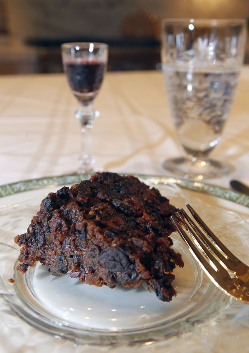 Al Hartmann  |  The Salt Lake Tribune
Steamed Christmas pudding -- a rich dessert of raisins, currants, apple orange and lemon zest, with brandy, beef suet, almonds, walnuts and eggs -- is part of a "Downton Abbey" menu offered at a Viking Cooking School class.