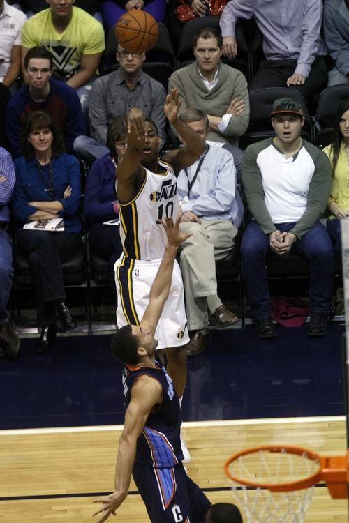 Chris Detrick  |  The Salt Lake Tribune
Utah Jazz point guard Alec Burks (10) shoots over Charlotte Bobcats shooting guard Jeffery Taylor (44) during the first half of the game at EnergySolutions Arena Friday March 1, 2013.