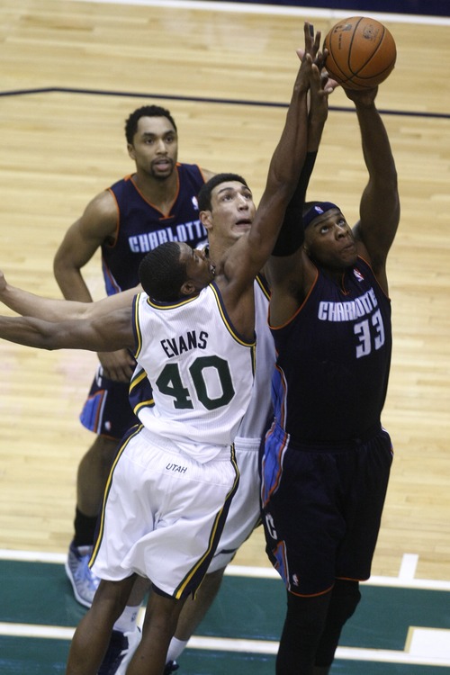 Chris Detrick  |  The Salt Lake Tribune
Utah Jazz small forward Jeremy Evans (40) Utah Jazz center Enes Kanter (0) and Charlotte Bobcats center Brendan Haywood (33) go for a rebound during the first half of the game at EnergySolutions Arena Friday March 1, 2013.