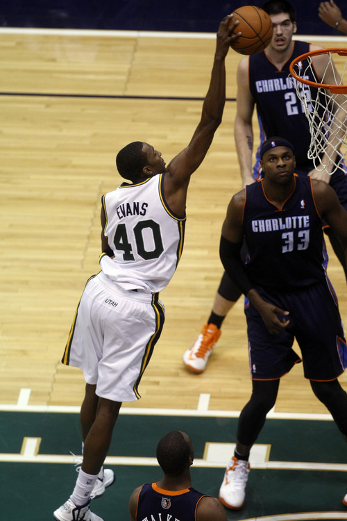 Chris Detrick  |  The Salt Lake Tribune
Utah Jazz small forward Jeremy Evans (40) dunks the ball past Charlotte Bobcats center Brendan Haywood (33) during the first half of the game at EnergySolutions Arena Friday March 1, 2013.