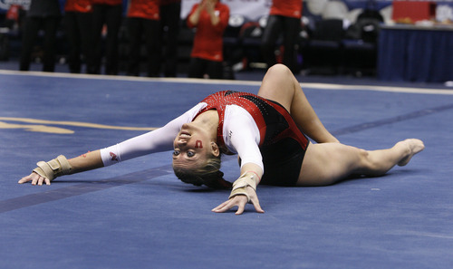 Scott Sommerdorf   |  The Salt Lake Tribune
Utah's Mary Beth Lofgren finishes her 9.850 floor exercise performance as the Utah Red Rocks won a tri meet versus BYU and North Carolina State at BYU, Friday, March 1, 2013. Utah finished with 197.125 points to BYU's 195.000, and N.C.St. with 194.675.