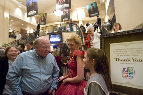 Kim Raff  |  The Salt Lake Tribune
Patron Gary A. Lynn, left, compliments actresses Brittany Sanders, center, and Olivia Smith-Driggs, right, after a sold-out production of "Chitty Chitty Bang Bang" at Hale Centre Theatre in West Valley City on Thursday. Hale Centre Theatre made a head-turning request to the Utah Legislature for $2 million toward the estimated $65 million cost of its new theater. Citing its mission to provide affordable live theater to Utah audiences, plus consecutive sold-out seasons, Hale officials have decided to move to Sandy, where they plan to build a $65 million, three-stage venue that will have triple the seats of its current theater.