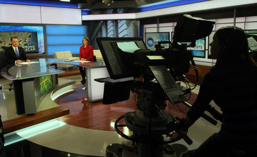 Rick Egan  | The Salt Lake Tribune 

KSL News anchors, Dave McCann (left) and Nadine Wimmer  (right) on the set of the 6:00 news at the KSL studio in Salt Lake City, Wednesday, February 27, 2013.