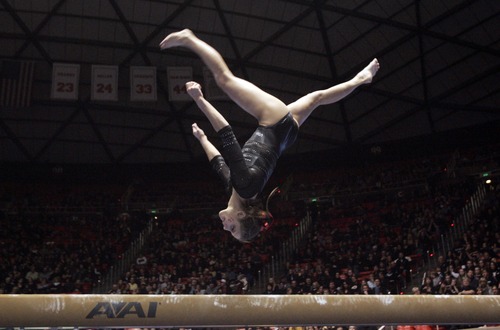 Kim Raff  |  The Salt Lake Tribune
University of Utah gymnast Breanna Hughes performs a beam routine during a meet against Stanford at the Huntsman Center in Salt Lake City on February 23, 2013.